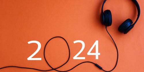 Cuffie musicali il cui filo forma lo "0" di 2024