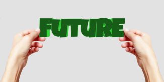 Due mani tengono la scritta "Future"