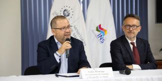 Carlos Alvarenga (a sinistra) e Gianni Bonelli seduti al tavolo dei relatori