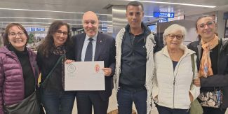 L'arrivo del ricercatore palestinese (alla sua destra l'Assessore del Comune di Pavia Francesco Brendolise)