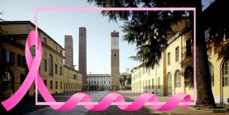 Torri di Piazza Leonardo da Vinci a Pavia. In sovrimpressione fiocco rosa per la prevenzione oncologica