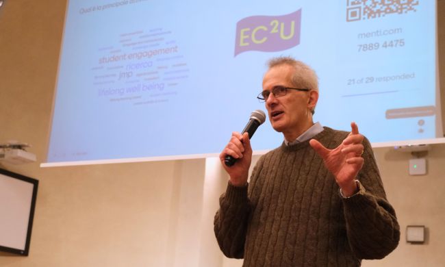 Prof. Carretta talking about lifelong learning activities and achievements among the EC2U Universities