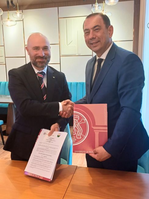 Vice-Rector Alvaro signing the MOU agreement with the Toshkent State Agrarian University